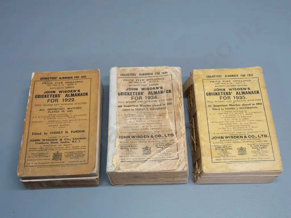 3 Wisden Cricketer's Almanack books - 1922, 1934 and 1935 - spines damaged / taped, marks and wear Image 1++