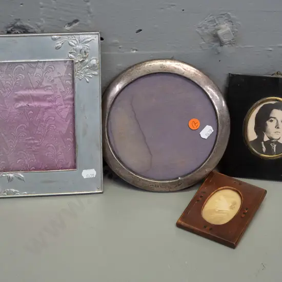 4 vintage picture or photo frames - round sterling silver, small inlaid wood, ebonised wood and pressed metal with