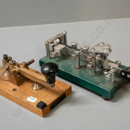 2 vintage Morse code keys with AW McCarthy Dunedin & Invercargill plaques - one painted cast metal, other is brass on