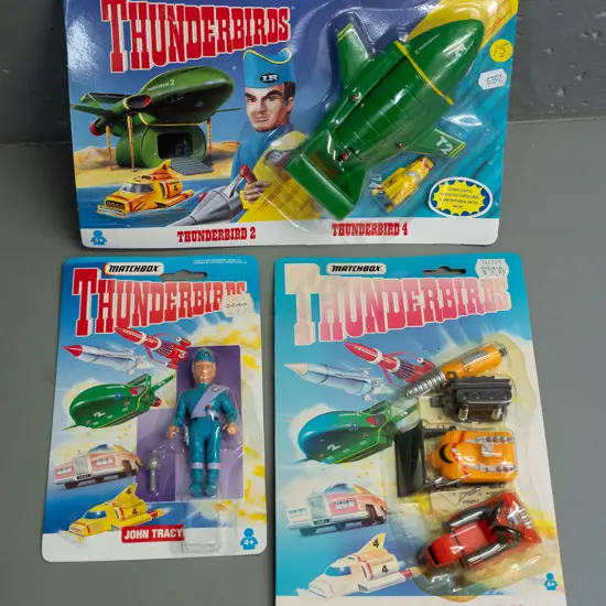3 carded Matchbox Thunderbirds figures and vehicle, dated 1993 & 1994 - Thunderbird 2 and Thunderbird 4 set, John Tracy,