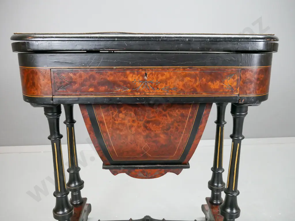 early Victorian work & games table with amboyna veneer panels, boxwood stringing, ebonised legs, brass applied Image 1++