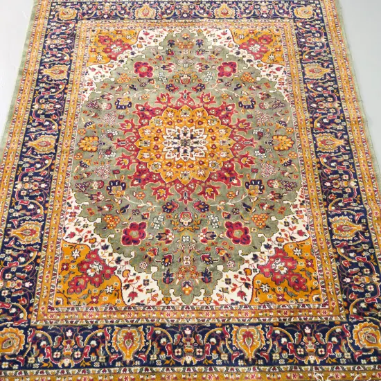 Persian style fine wool or silk? floor rug - multi coloured greens, blues, yellows and reds - some wear to edging L-1700