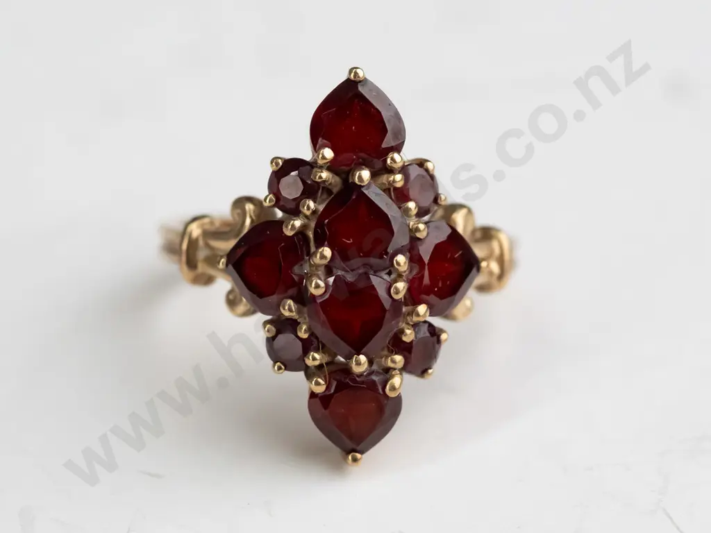 9ct gold ring with garnet clusters 3.7gms - size  O.5 Image 1++
