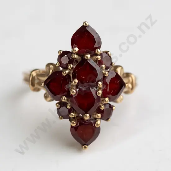 9ct gold ring with garnet clusters 3.7gms - size  O.5