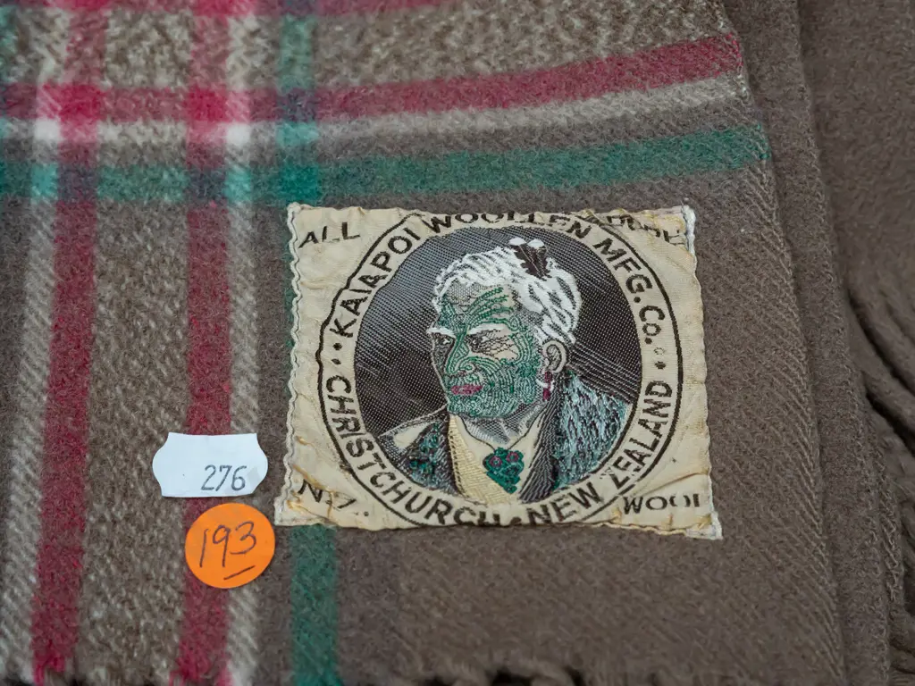 woollen travel rug with Kaiapoi Woollen Christchurch Maori chief label - small spots of staining Image 1++