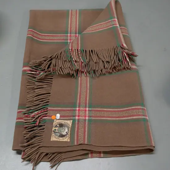 woollen travel rug with Kaiapoi Woollen Christchurch Maori chief label - small spots of staining