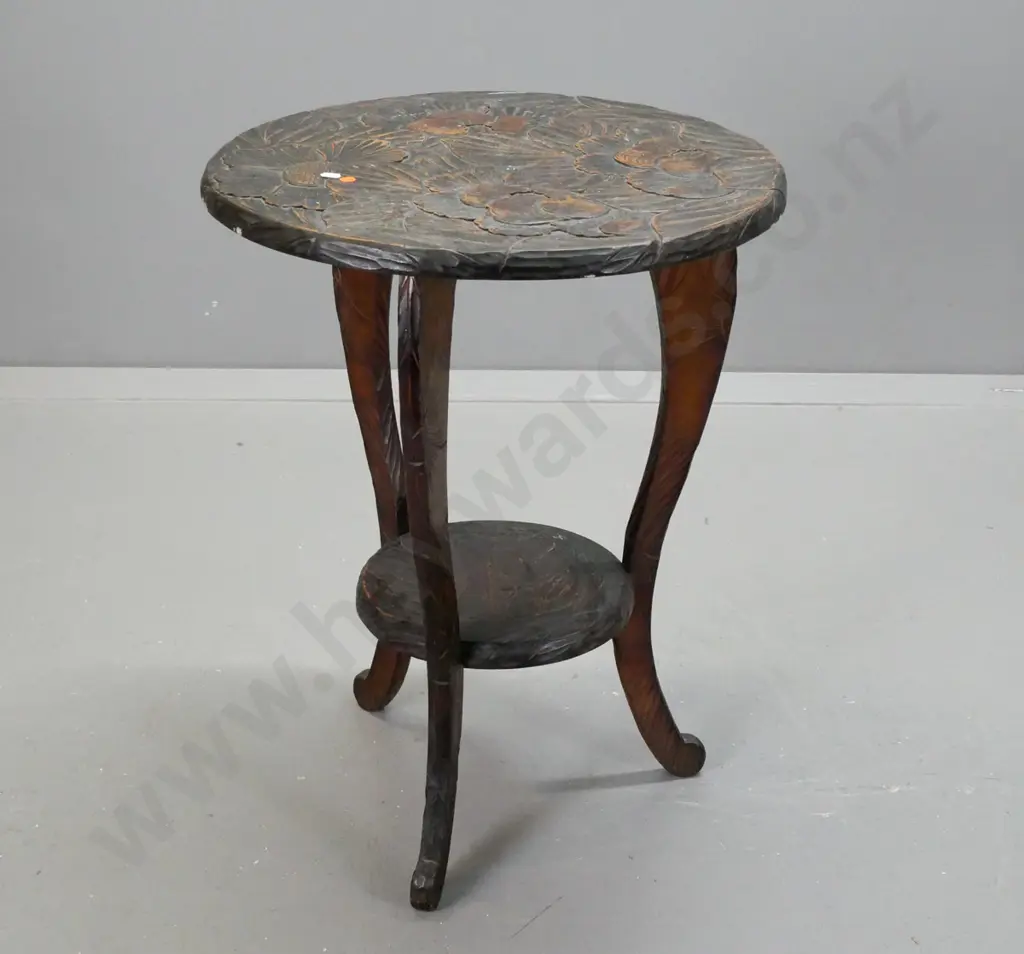 vintage beech lamp table with carved floral decoration to top and legs, carved sweeping legs, bottom shelf, some wear Image 1++