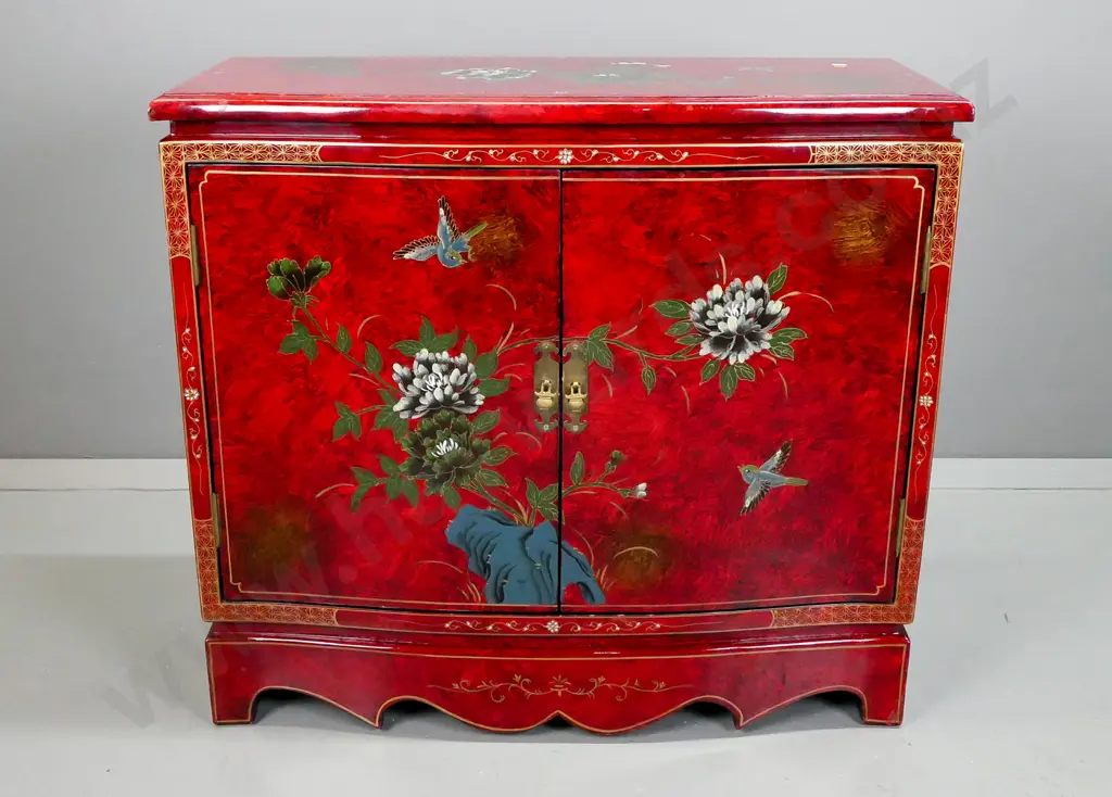 Chinese 2 door cupboard with shaped front and plinth base, red painted finish with hand painted floral and bird motifs, Image 1++