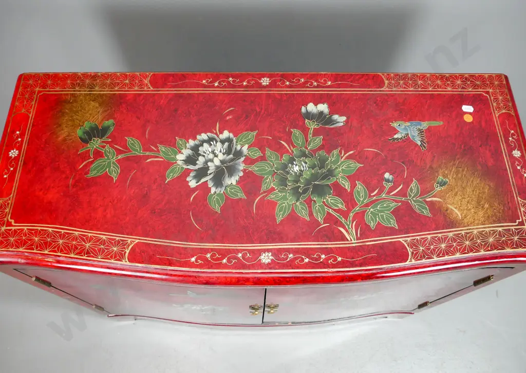 Chinese 2 door cupboard with shaped front and plinth base, red painted finish with hand painted floral and bird motifs, Image 1++