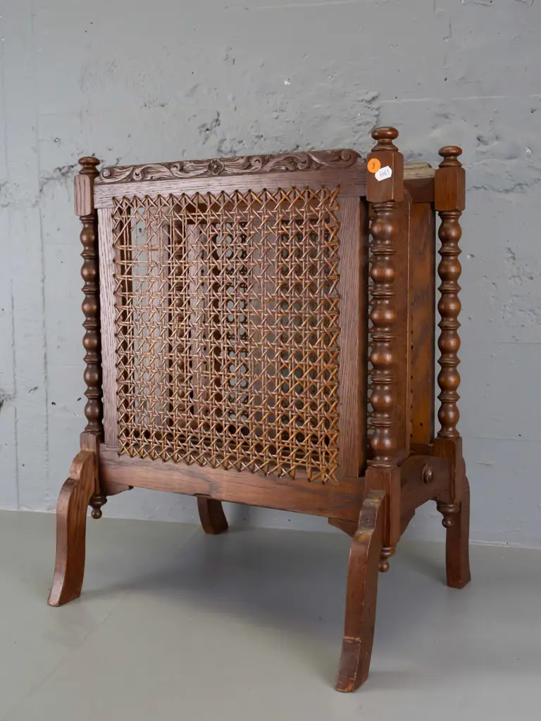 vintage dark-stained oak magazine rack with turned spindle ends and finials, 2 woven cane panels - minor damage to cane, Image 1++