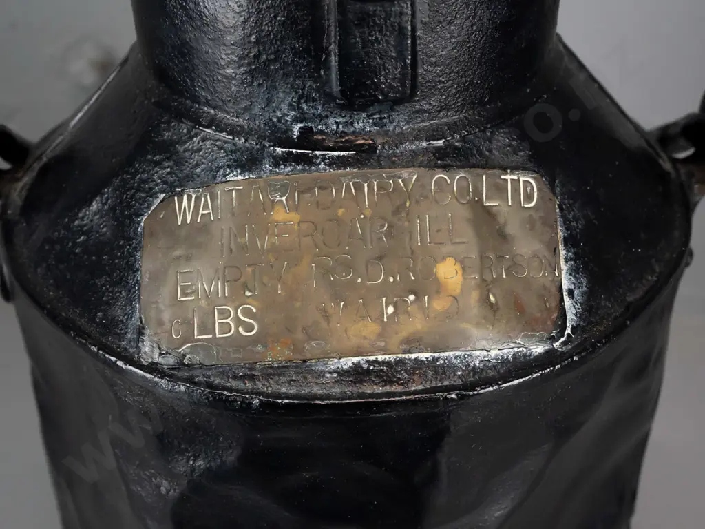 vintage milk can with brass plaque for (Waitari?) Dairy Co Invercargill, D. Robertson, Wairio - painted black. Image 1++