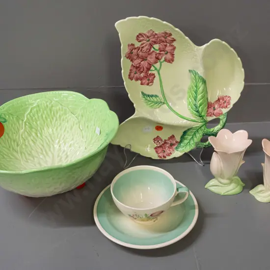 Susie Cooper cup & saucer, Carlton Ware segmented dish & 2 small bud vases and a Midwinter salad bowl. Carlton Ware have