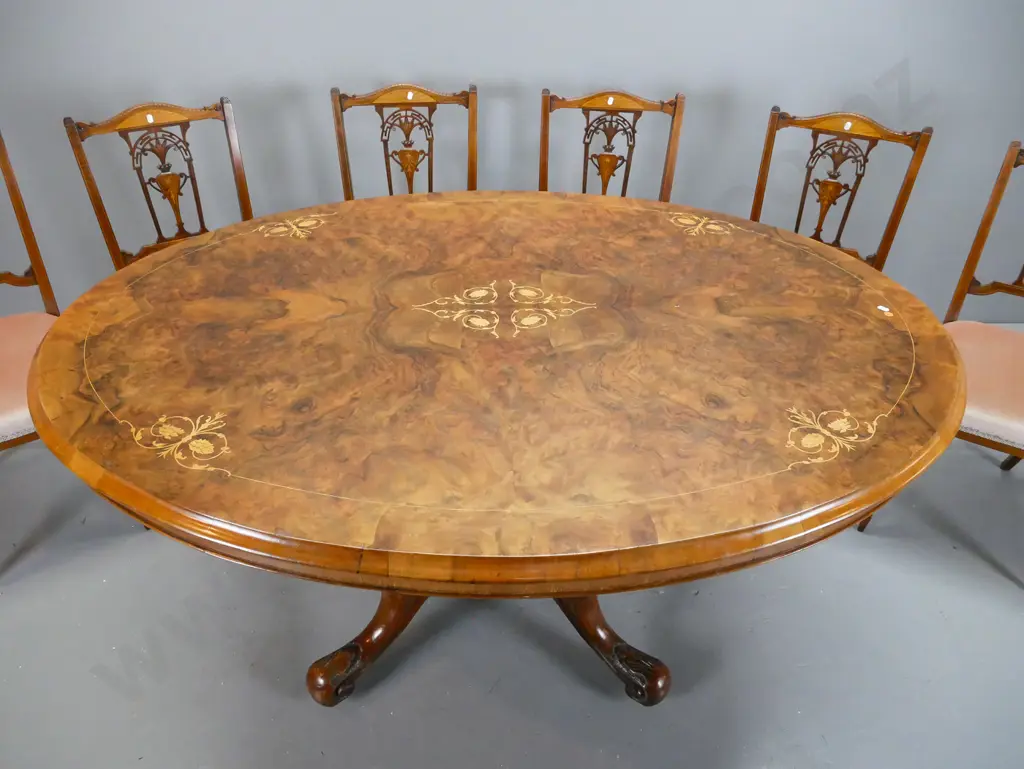 Victorian oval tilt-top table with walnut top, boxwood stringing & floral inlay, on 4-point carved elm pedestal base, Image 1++