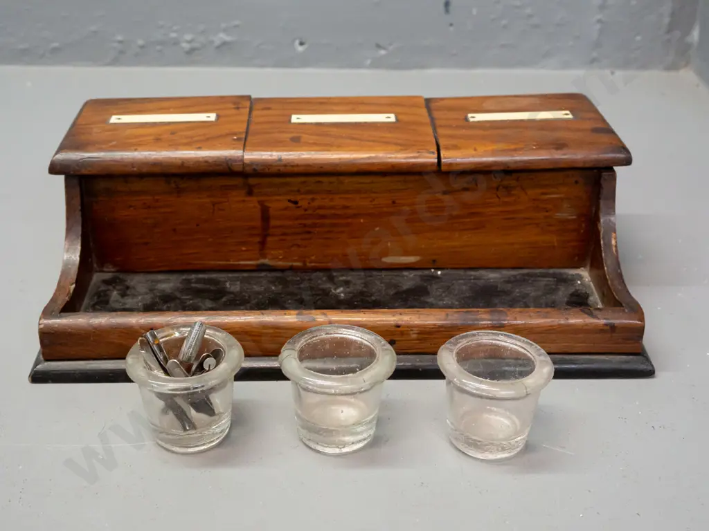 vintage inkwell stand with 3x glass liners & 3x hinged lids w/faux bone labels. Incl some rusty pen nibs. Image 1++