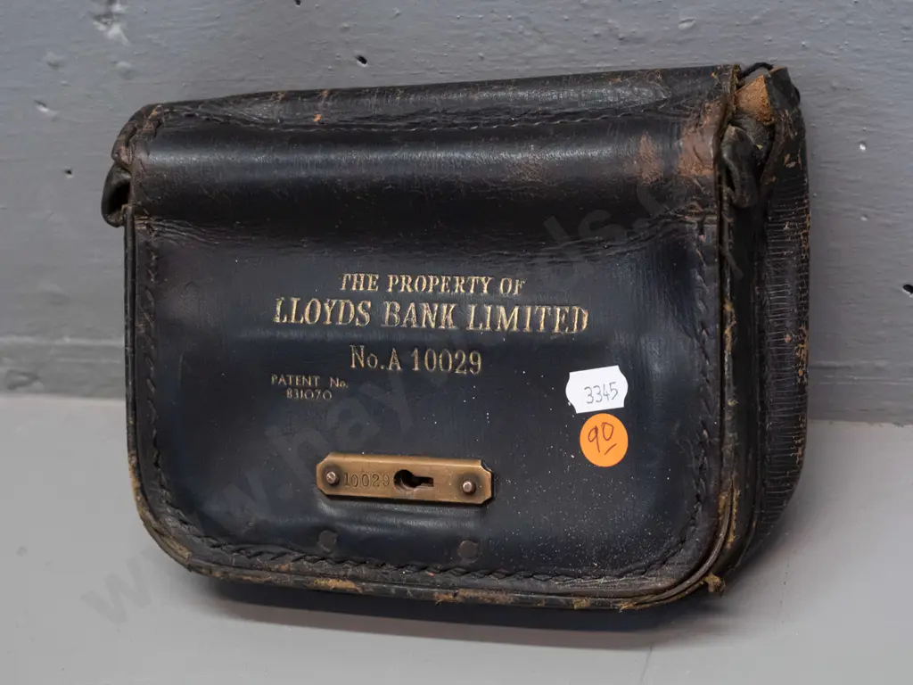 vintage leather bank currency pouch marked Property of Lloyd's Bank Limited with brass latch, locked with no key Image 1++