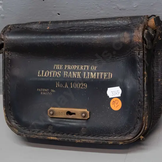 vintage leather bank currency pouch marked Property of Lloyd's Bank Limited with brass latch, locked with no key