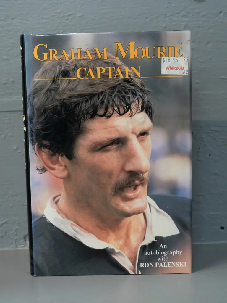 autographed hard cover book - signed by Graham Mourie - see photo for details - minor fading to dust cover Image 1++