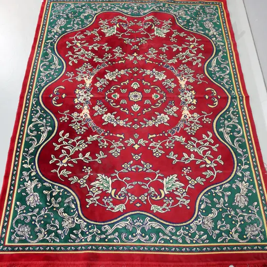 Turkish machine woven floor rug with "Kale" maker label, in red and green - minor fraying to fringe L-1940 W-1380