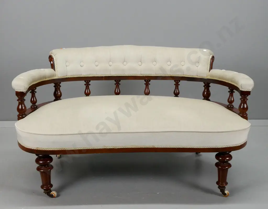 Victorian beech & kauri tub settee with rolled buttoned upholstered back, turned gallery, turned front legs, on Image 1++