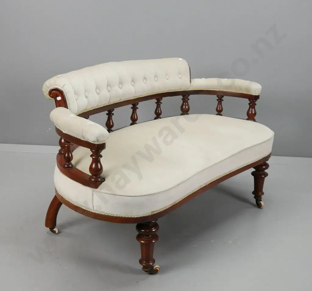 Victorian beech & kauri tub settee with rolled buttoned upholstered back, turned gallery, turned front legs, on Image 1++