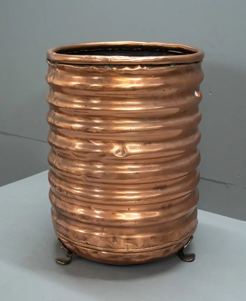 ribbed copper wood bin on 3 cast metal feet, original plumbing hole patched on bottom - a few dents H-530 D-390 Image 1++