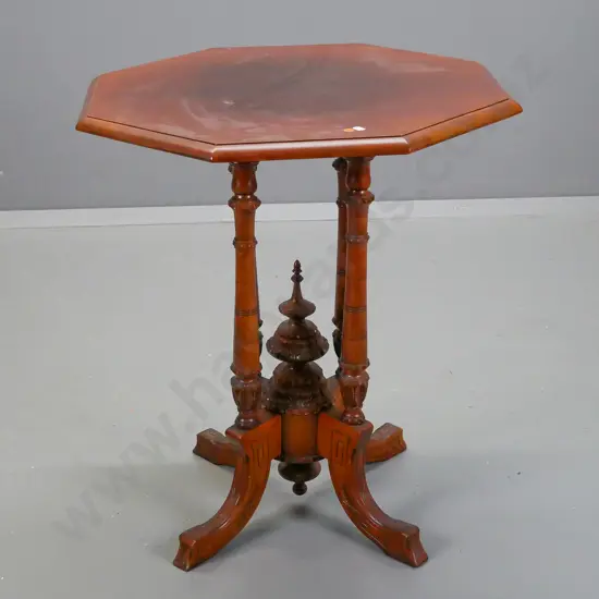 colonial kauri side table with octagonal top, cathedral 4-point base, turned and carved central finial. Fading on top, a