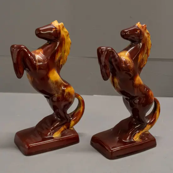 2 Blue Mountain brown and ochre rearing horse figures H-230