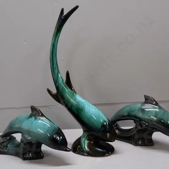 3 Blue Mountain pottery items - pair of medium size leaping dolphins H-160 L-310 and a diving fish H-470