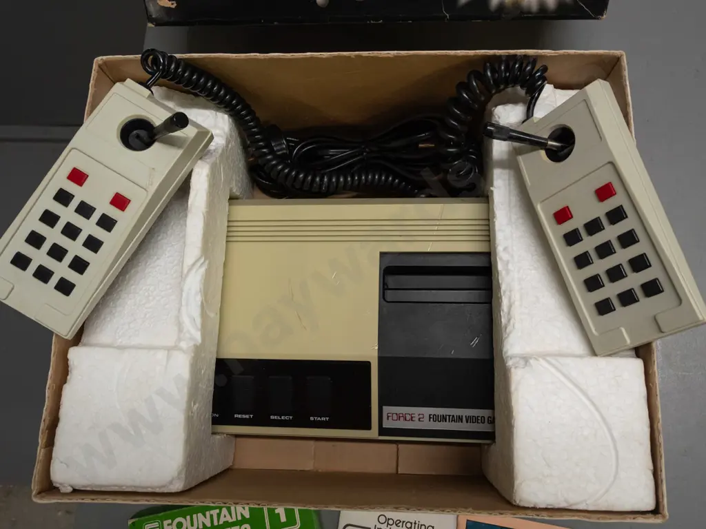Fountain video game console in original box with one game cartridge and instructions - untested. Image 1++