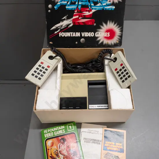 Fountain video game console in original box with one game cartridge and instructions - untested.