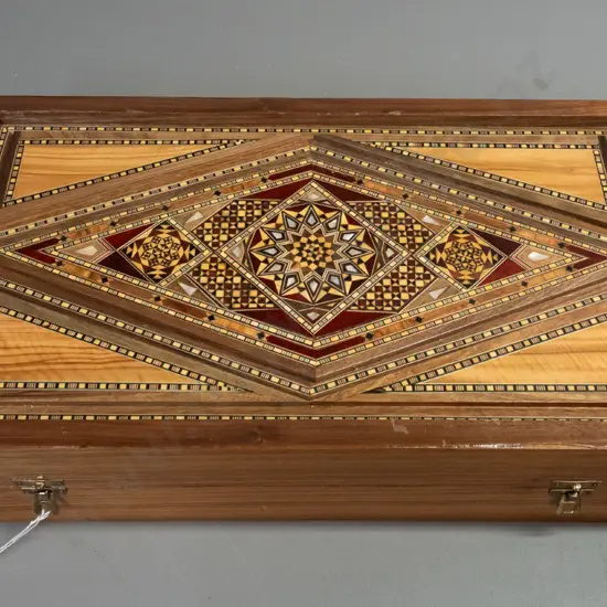 Syrian intricately inlaid mixed timber and mother of pearl backgammon set w/ tigers eye and lapis lazuli playing pieces.