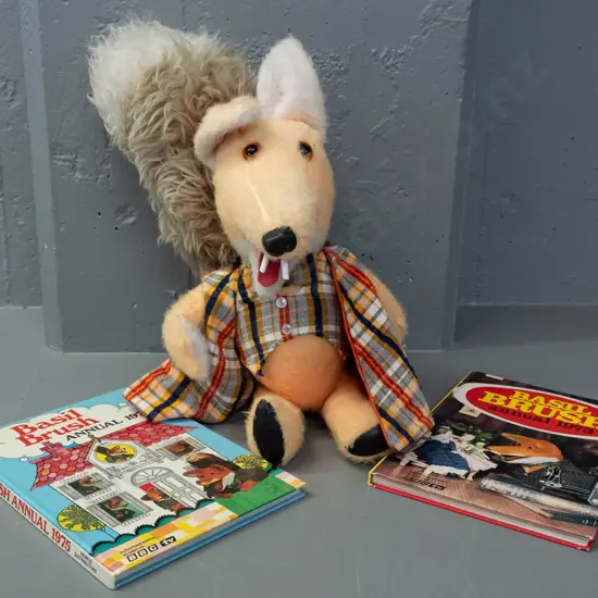 Basil Brush plush toy with plaid jacket H-410 and 2 annuals - 1973 and 1975.