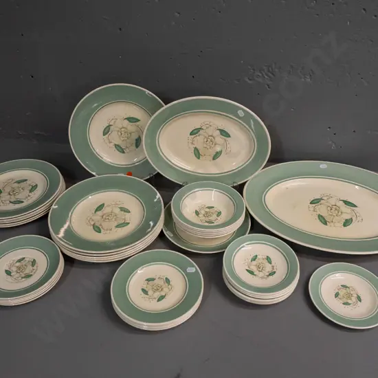 37 assorted pieces of Susie Cooper Gardenia pattern table ware - large and small ashetts, varying sizes of plates, bowls