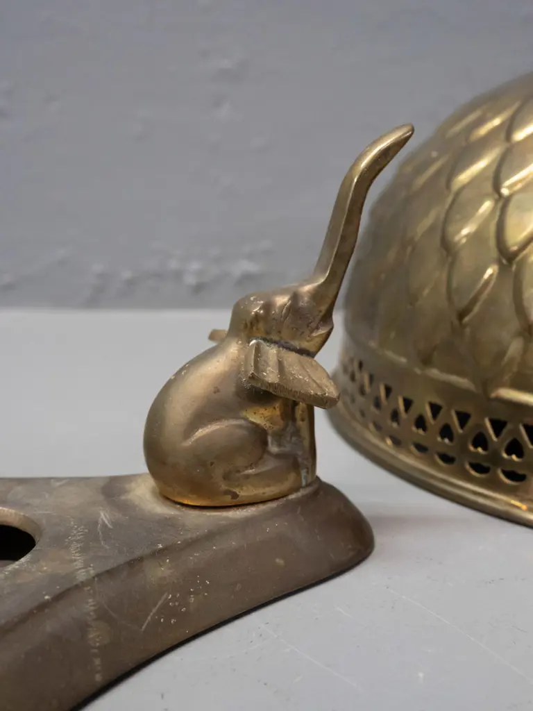 brass bowl with pierced top rim, beaten motifs, rounded bottom on tri-form base with elephant supports - some dis- Image 1++