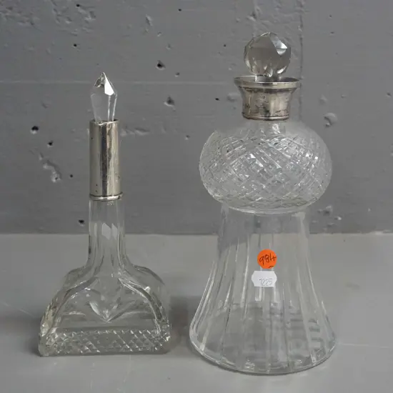 2 sterling silver mounted large scent bottles - deco style shapes, both stoppers likely not original, chip to tip of