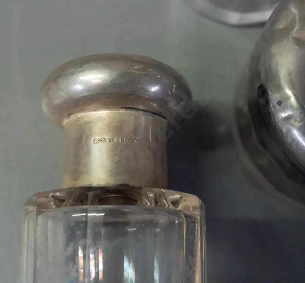 4-piece Glass and Sterling Silver dressing table set. Tops marked '950 HG'. Small chips to glass, denting to silver lids Image 1++