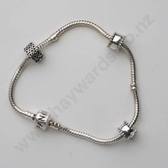 Pandora bracelet and 3 charms