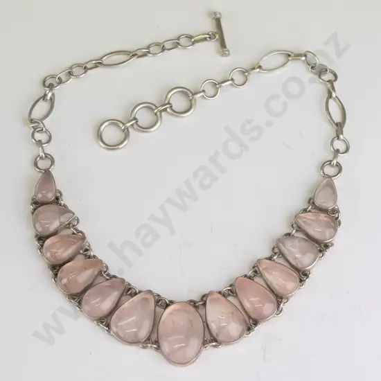 silver necklace with pale pink stones stamped 925