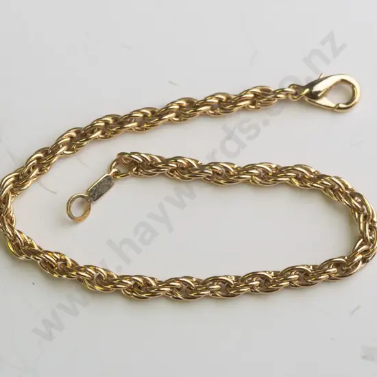gold bracelet stamped 18kt (5.6gm)