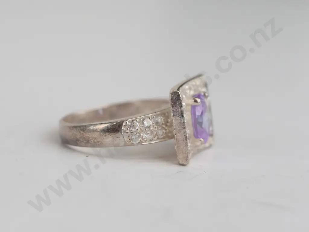 cz and purple stone sterling silver ring - size O.5 Image 1++