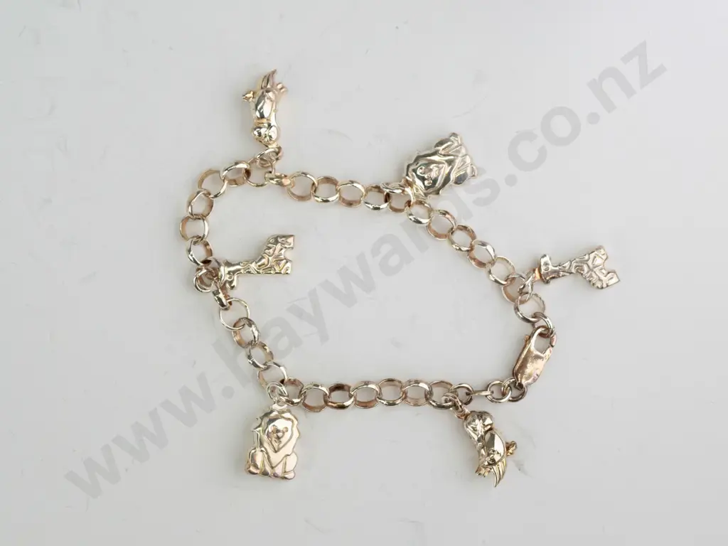 sterling silver charm bracelet with 6 charms Image 1++
