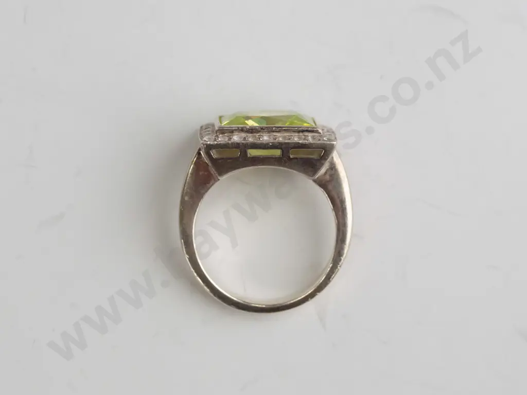 cz and peridot? sterling silver ring - size O.5 Image 1++