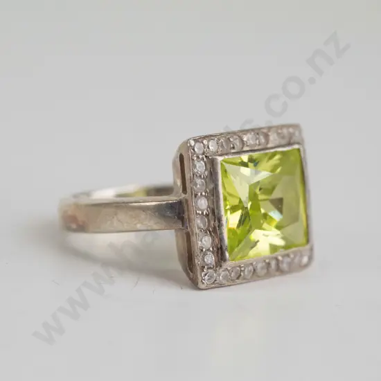 cz and peridot? sterling silver ring - size O.5