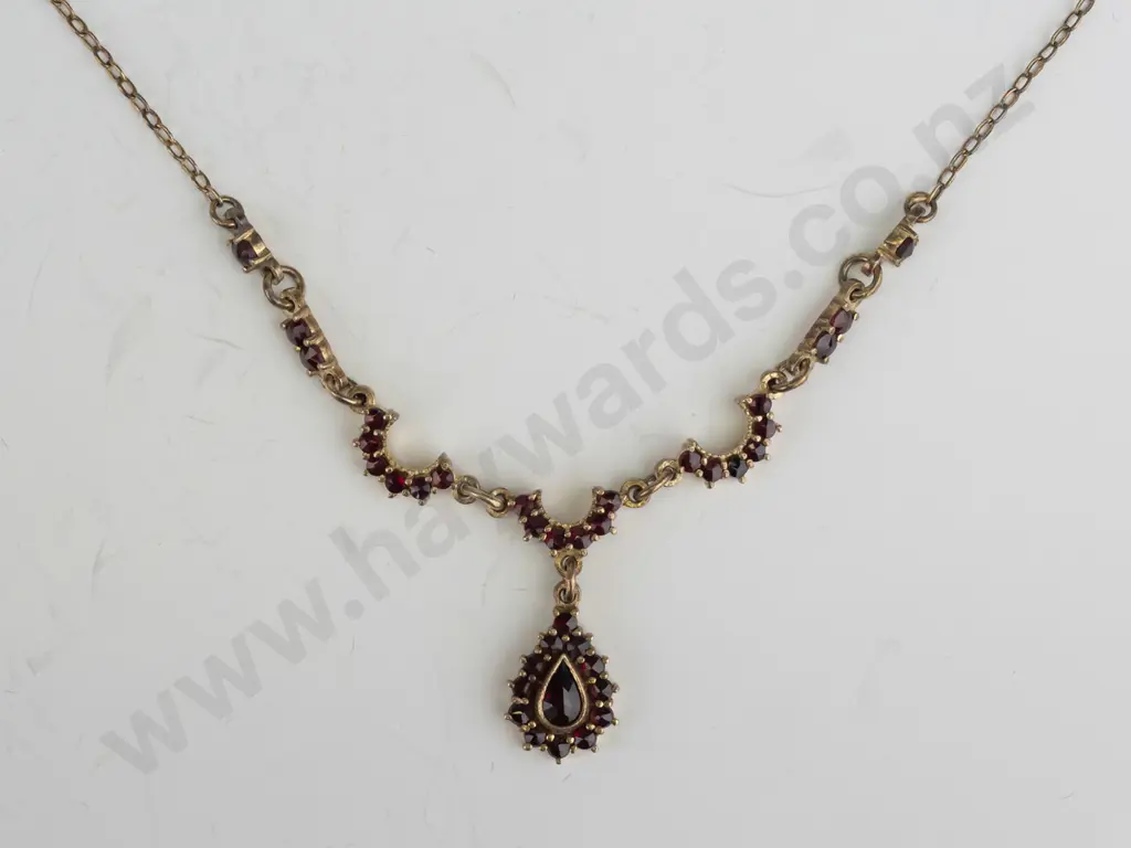 red stone pear drop pendant gold plated - no mark Image 1++