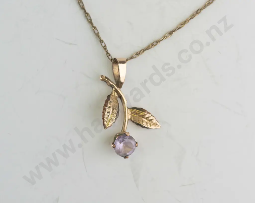 14kt rolled gold chain and pendant with purple stone Image 1++