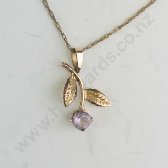 14kt rolled gold chain and pendant with purple stone