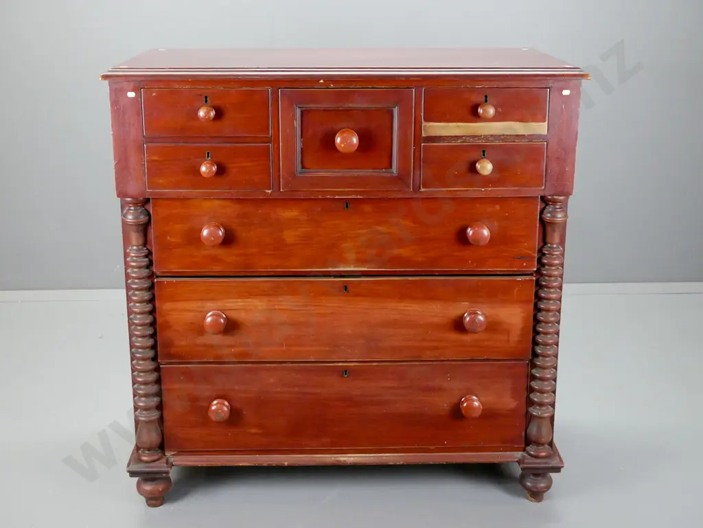 colonial kauri 7-drawer break front chest with half turned pilasters, wooden knobs, brass locks & escutcheons, on turned Image 1++