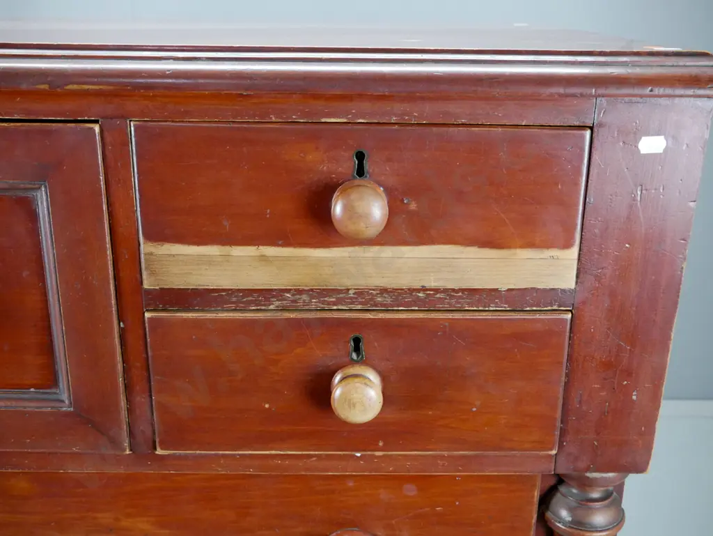 colonial kauri 7-drawer break front chest with half turned pilasters, wooden knobs, brass locks & escutcheons, on turned Image 1++
