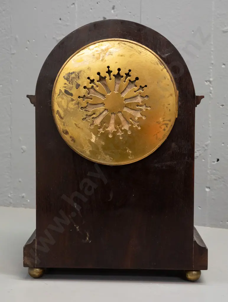 vintage wood-cased mantle clock w/ mixed timber inlay decoration, on brass ball feet. Enameled metal face. Untested Image 1++