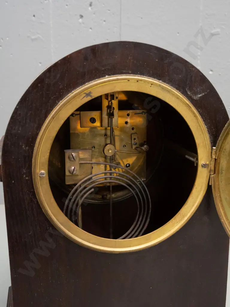 vintage wood-cased mantle clock w/ mixed timber inlay decoration, on brass ball feet. Enameled metal face. Untested Image 1++